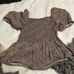 Leopard print blouse, so cute and comfy. Very flattering